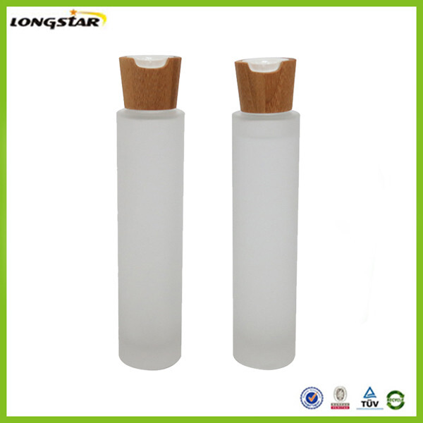 matte glass bottle with bamboo disc top cap